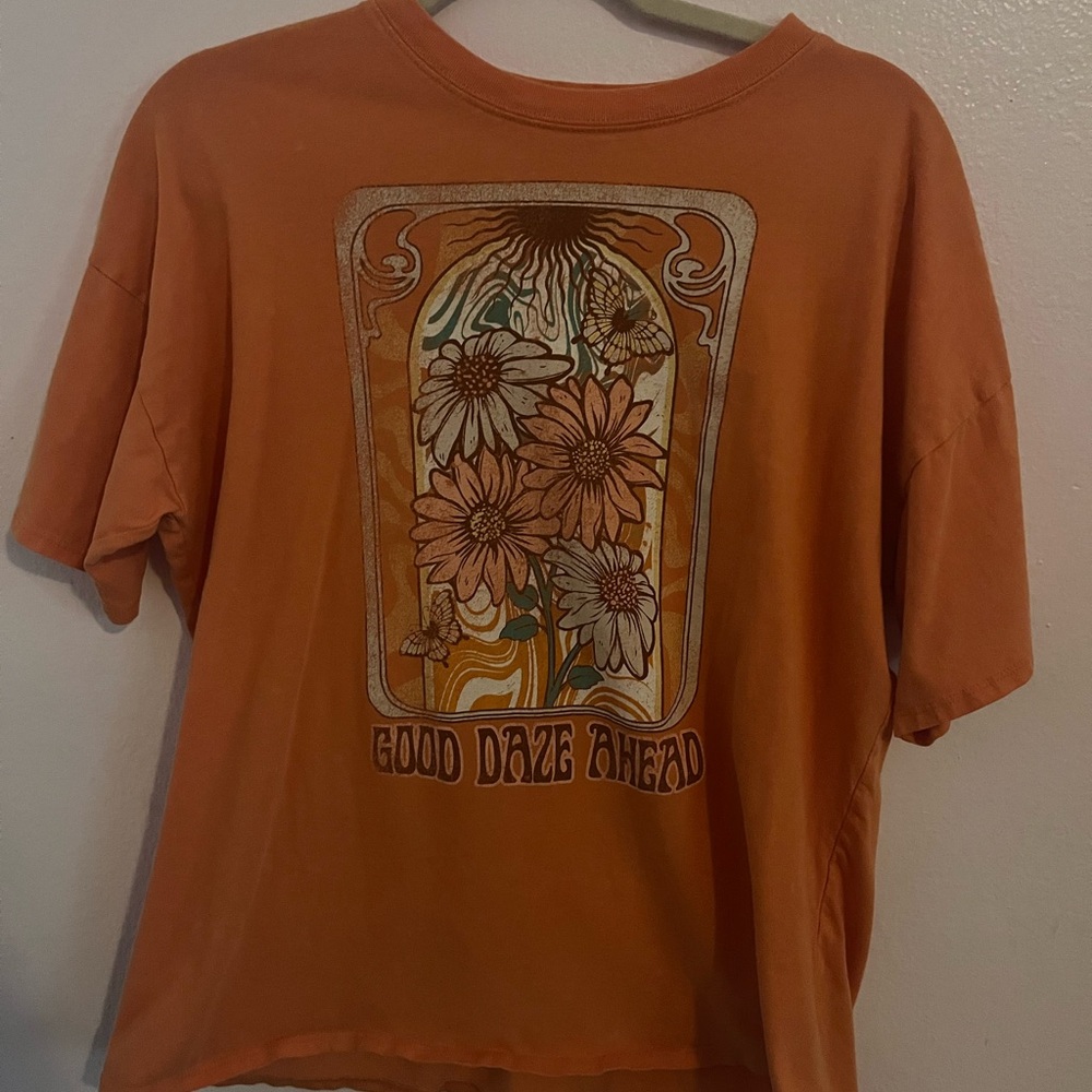 Orange Graphic T-Shirt with Floral Design
